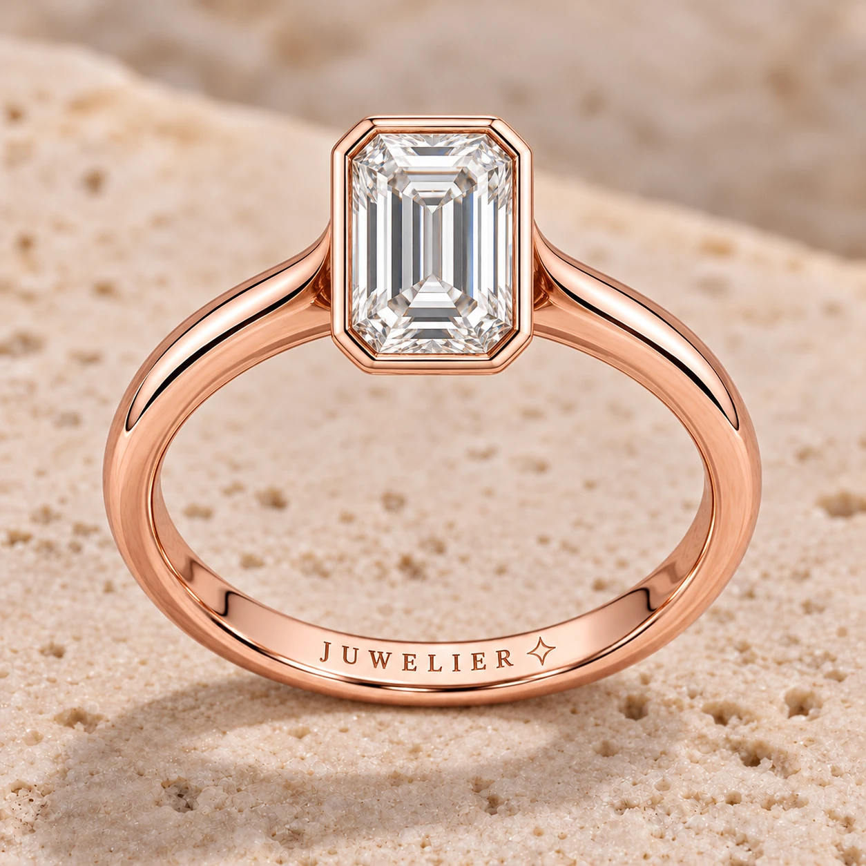 Emerald-cut bezel ring in rose gold